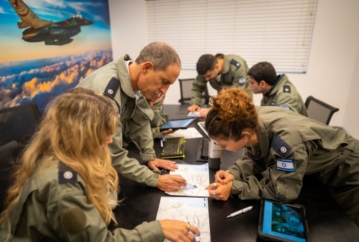 team making plans on maps