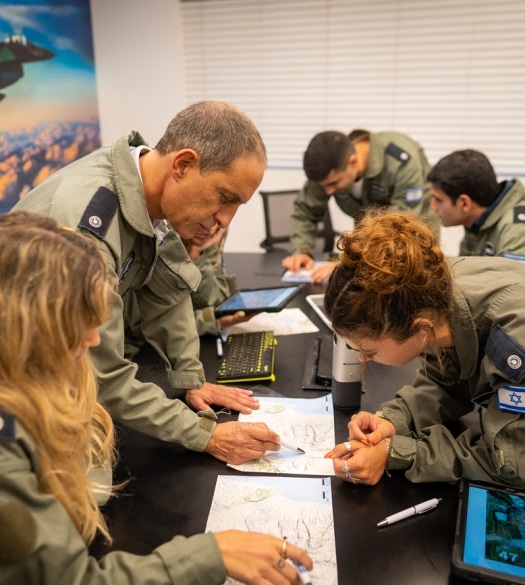 team making plans on maps