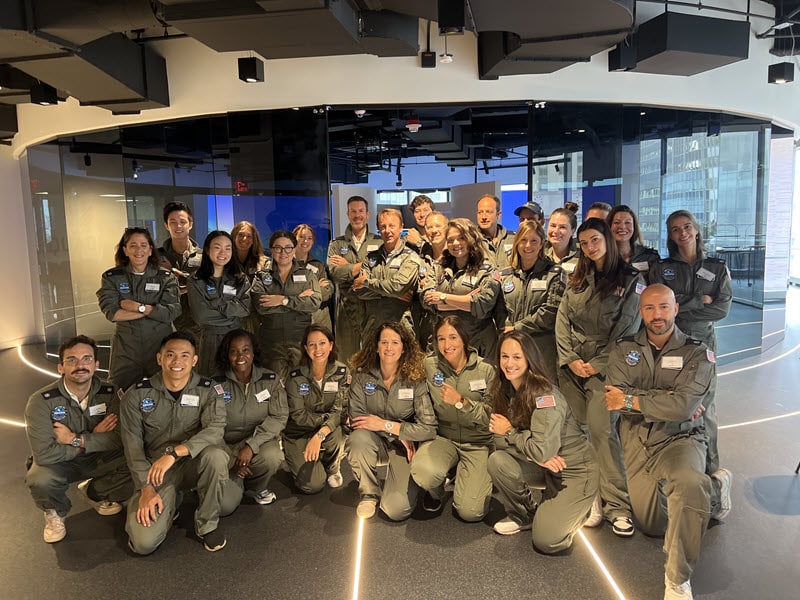 Team picture of everybody in jumpsuites